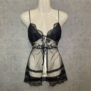 Vintage 2002 Victoria's Secret black lace lingerie with front tie detail.